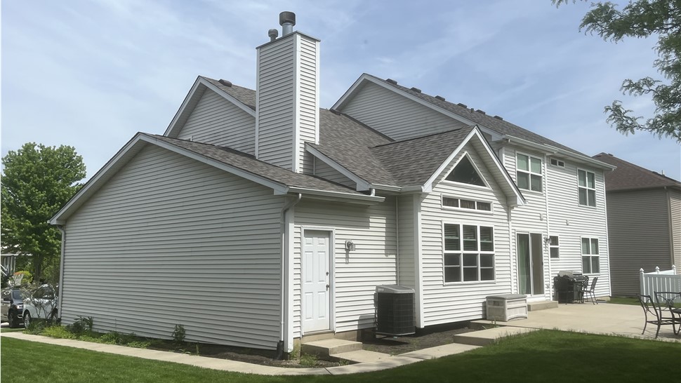 "Close-up view of a roof showcasing Owens Corner Driftwood Shingles, exemplifying their natural elegance and unmatched durability."