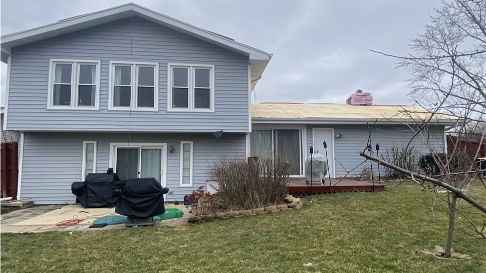 Woodale, Bloomingdale, Grayslake, Joliet, Plainfield, satisfied customer, seamless gutters, siding hail damage, siding repair, roofing repair, seamless gutter systems, affordable, wind damage.