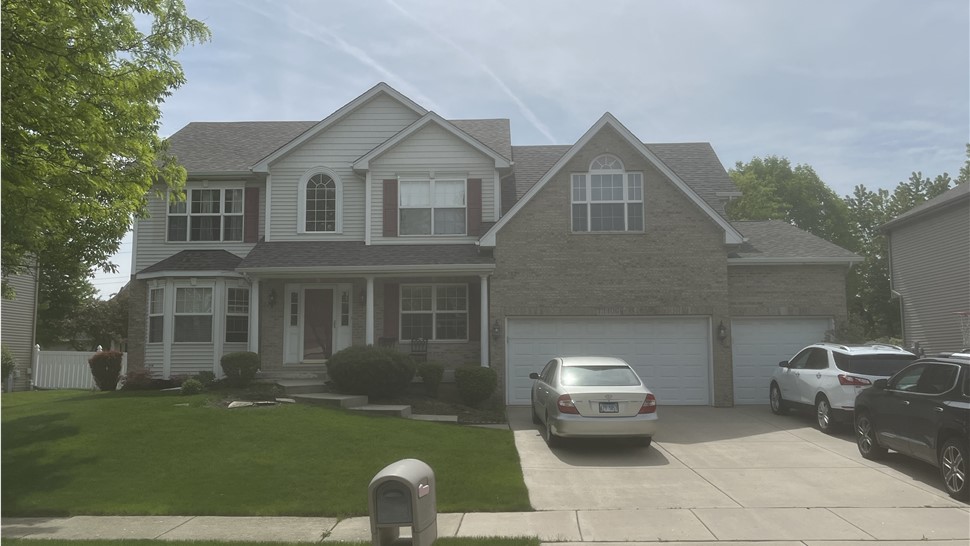 "Roof adorned with Owens Corner Driftwood Shingles, showcasing their natural beauty and exceptional quality."