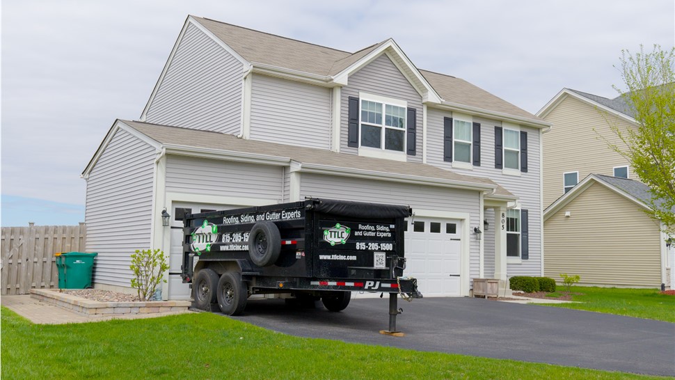 Roofing excellence exemplified - TTLC Roofing showcases a sturdy and professionally installed roof in Joliet