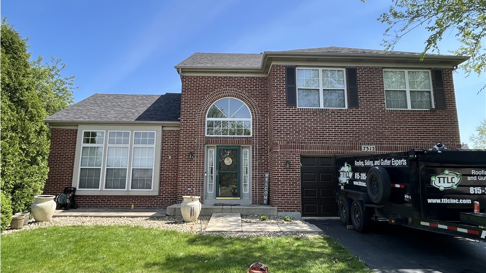 Transform Your Plainfield Roof with TTLC Roofing's Exquisite Onyx Black Installation, Showcasing Superior Craftsmanship and Lasting Quality.