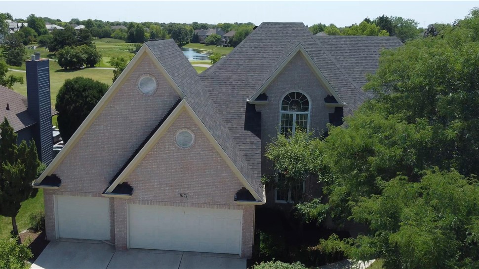 Roof installation in Aurora, Illinois; Owens Corning roof; Owens Corning Shingles "Black Sable"