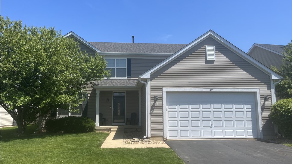 "Exemplary craftsmanship showcased by TTLC Roofing in Oswego, featuring the stunning Peppercorn by Owens Corning technique for long-lasting durability and captivating visual impact."