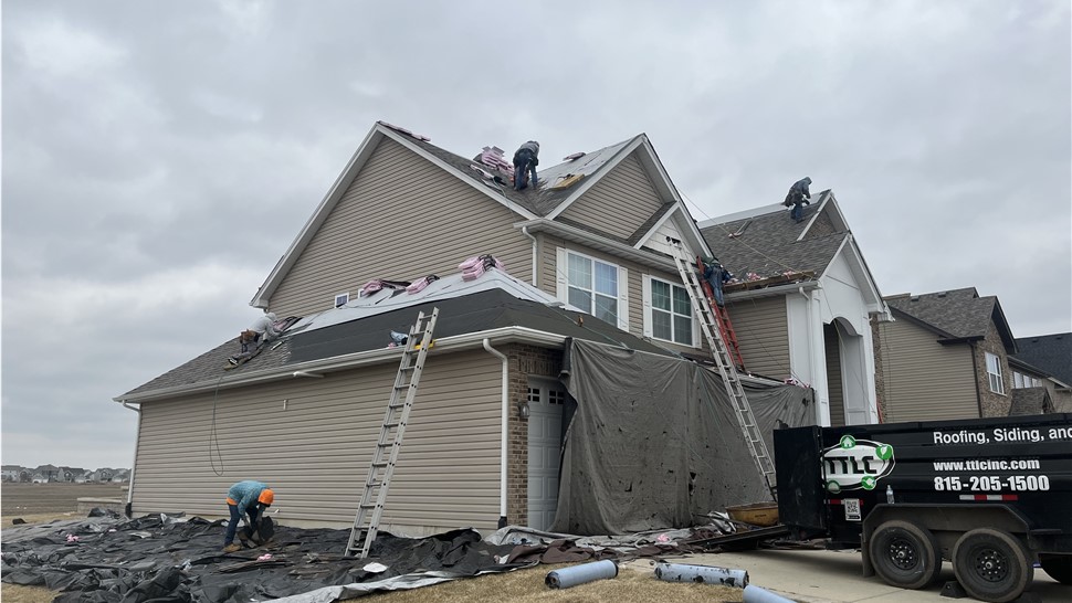 Front angle, roofing job, professional crew, affordable prices, bi-lingual, kind and courteous, reliable, durable, affordable.