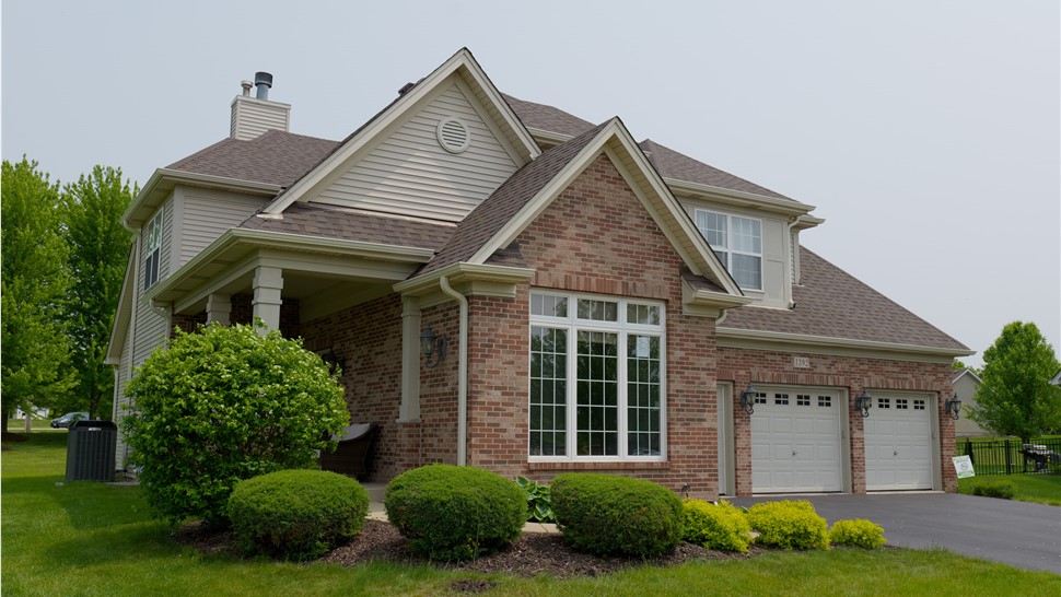 Roofing excellence exemplified - TTLC Roofing showcases a sturdy and professionally installed roof in Joliet