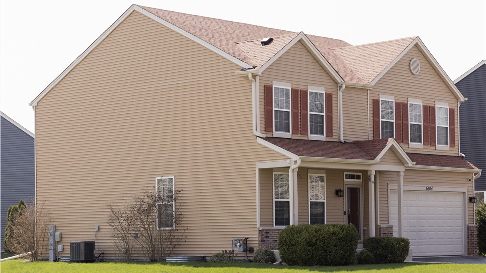 Storm Damage, Roofing, Gutters Project in Plainfield, IL by TTLC, Inc