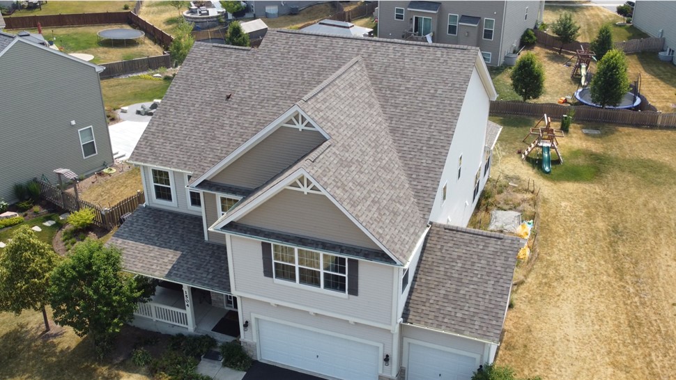 Enthralling Joliet, IL House: TTLC Inc. Unveils Exquisite Brilliance of Owens Corning Driftwood Shingles, Elevating Aesthetics & Endurance to Sublime Heights