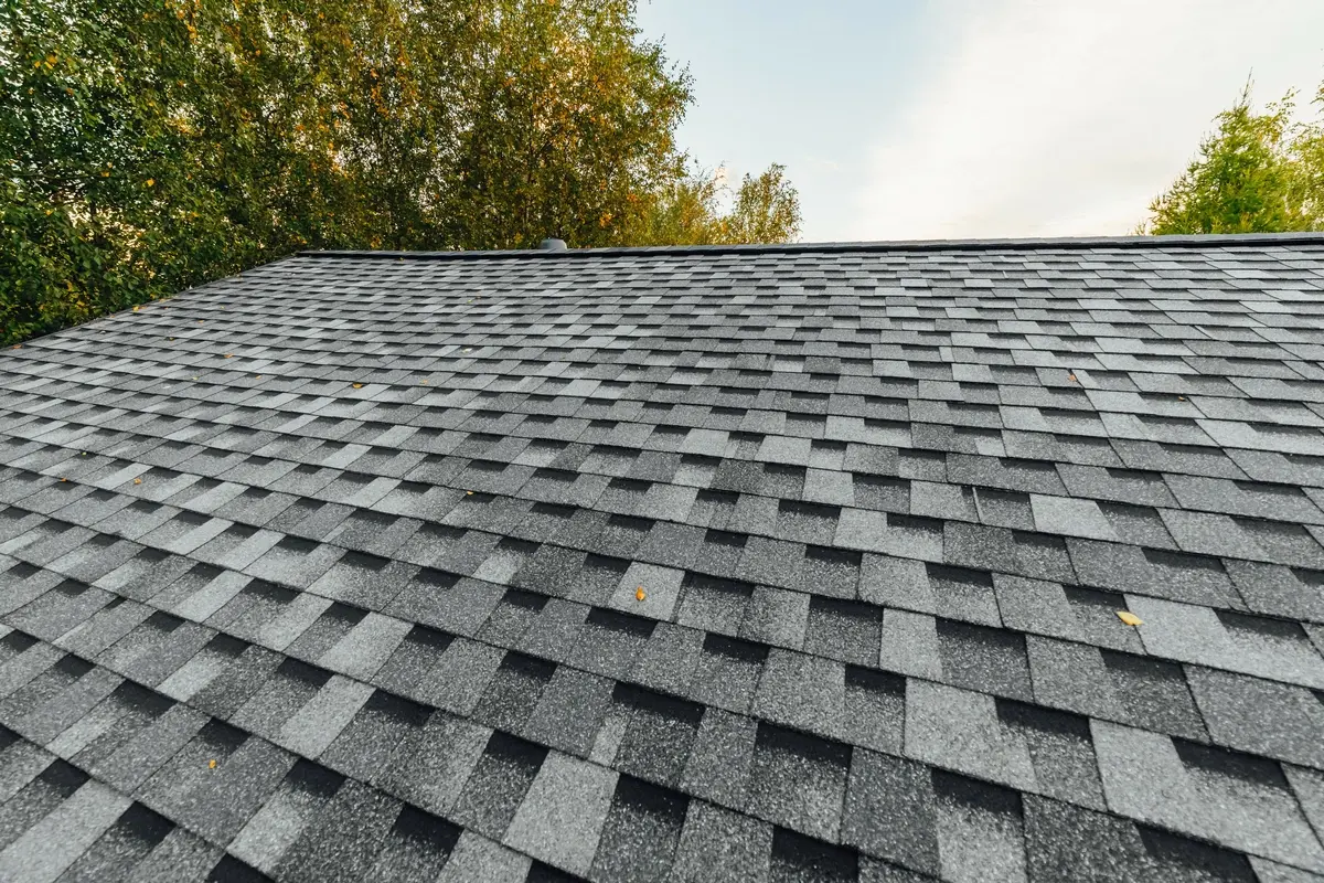 installing new shingles for roof