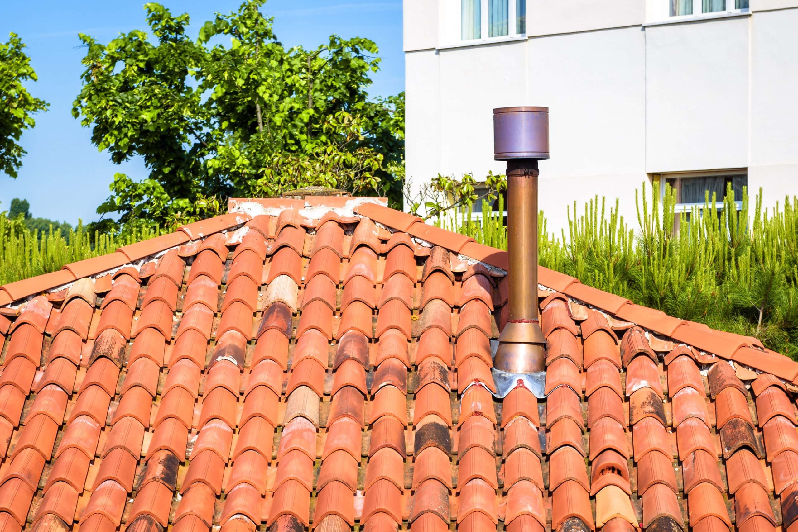 how vents and chimneys affect tile roof cost