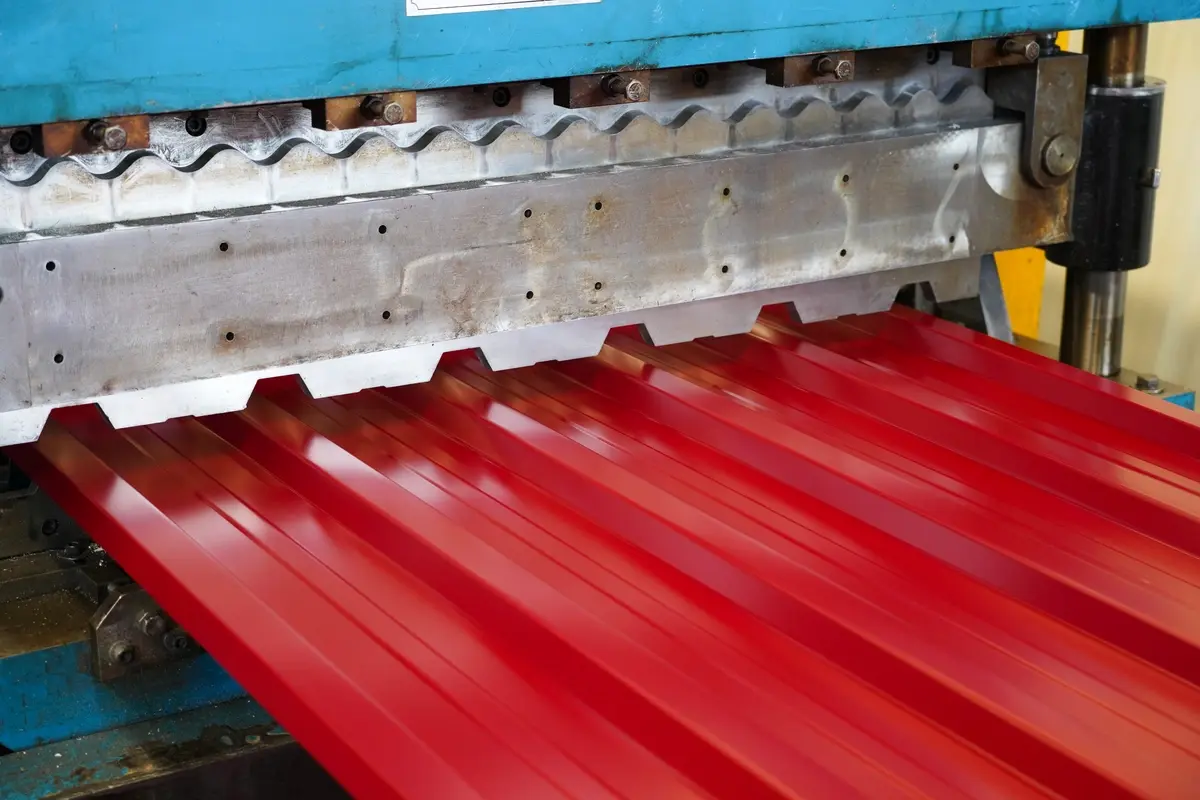 close up of the process of roll-form metal roofing type