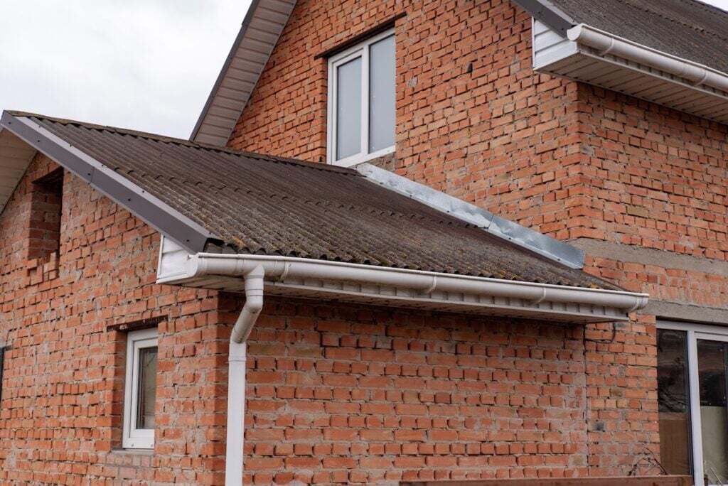 Flashing system installed on brick house