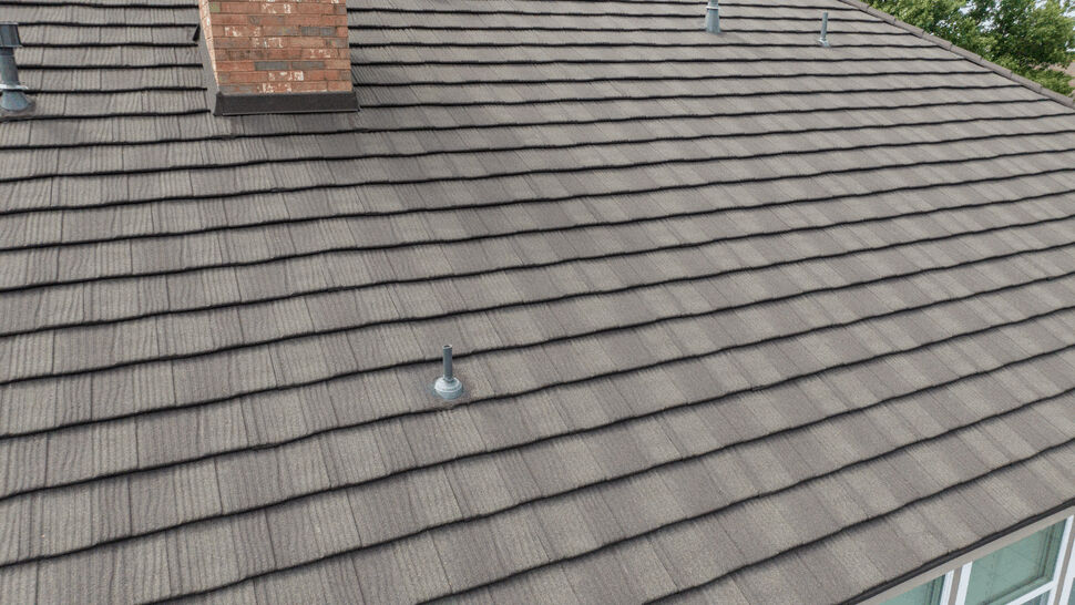 Chimney and Vents on Metal Shake Roof | US Metal Roofing Consortium Aerial view of metal shake roof with chimney and roof vents