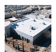 Drone view of a large commercial flat roof with multiple rooftop units