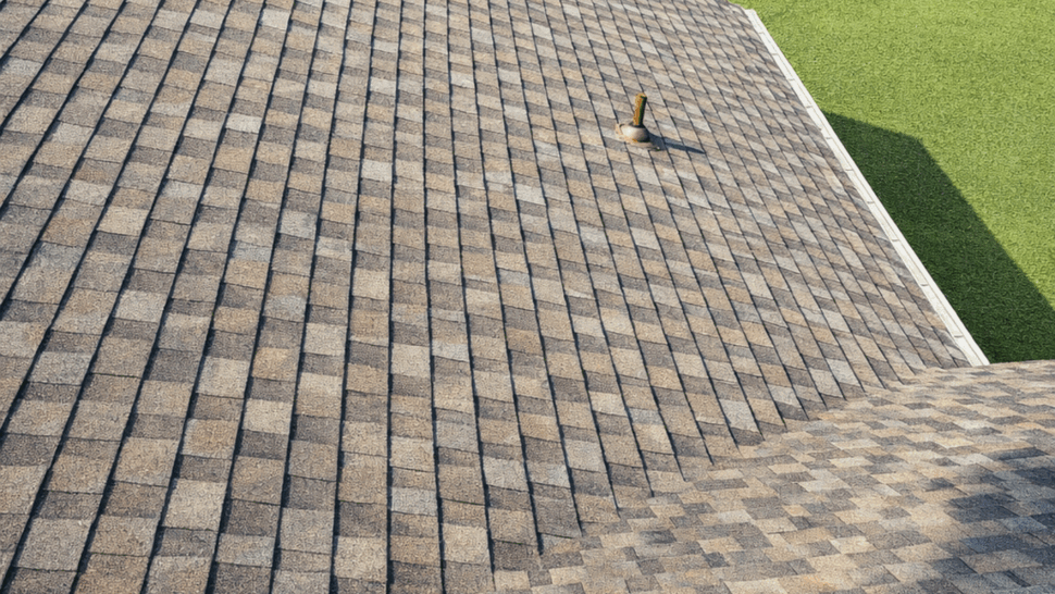 Shingle roof slope inspection | Tycos Roofing And Siding Inc Close-up look at patterned asphalt shingles on a sloped roof with a fenced pool below