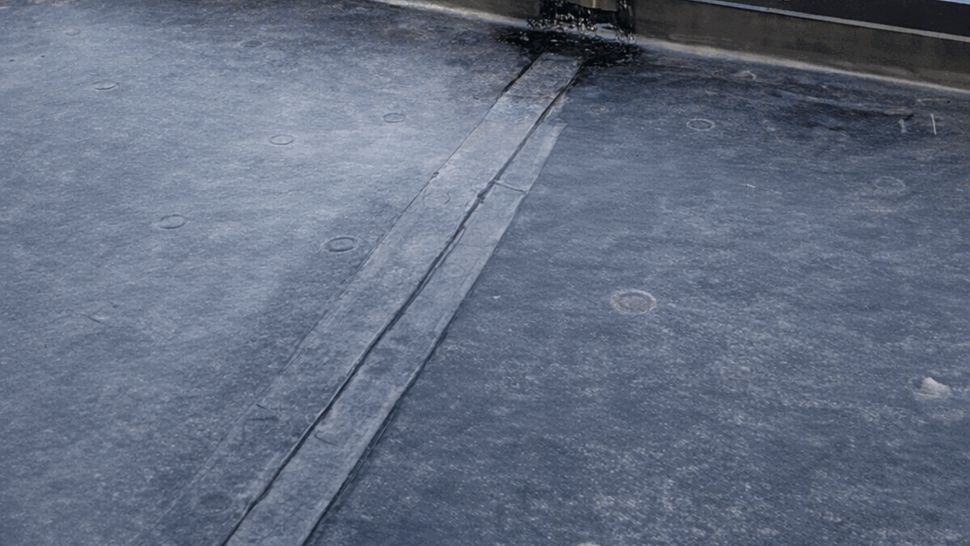 Detail of flat roof seam and membrane patching