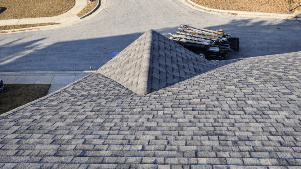 Aerial View of Asphalt Roof | Tycos Roofing And Siding Inc Aerial view looking down over a residential roof covered in asphalt shingles.
