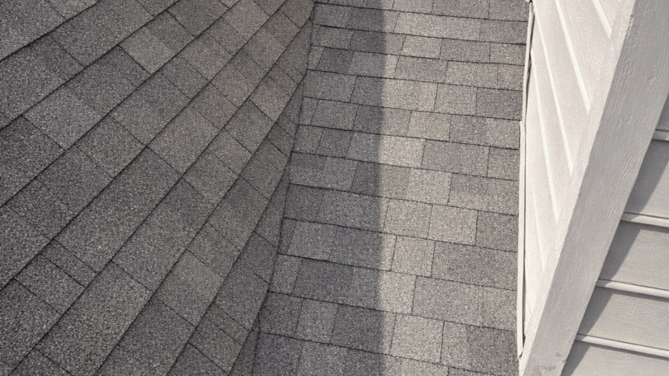 Roof valley and flashing detail | Tycos Roofing And Siding Inc Close-up roof valley where shingles meet siding and flashing detail.