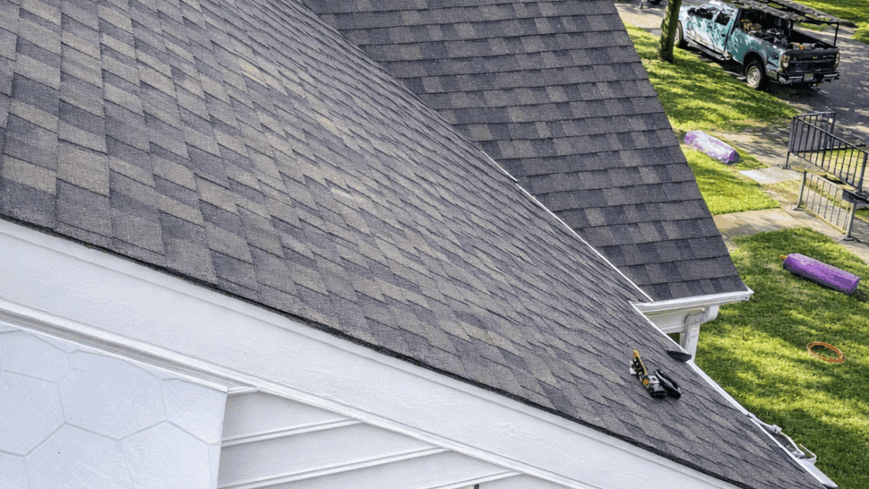 Roof ridge and gable shingles | Tycos Roofing And Siding Inc Overhead view of roof ridge and adjoining gable with asphalt shingles