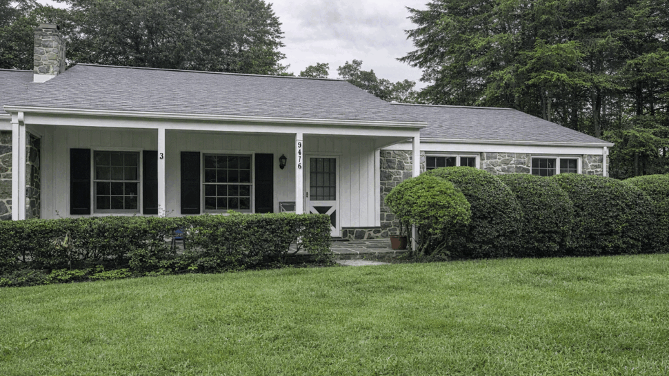 Wide Front View with New Roof | Tycos Roofing And Siding Inc Wide front lawn and trimmed hedges leading to house with new grey roof