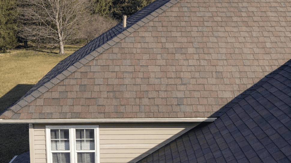 Aerial Shingle Roof View | Tycos Roofing And Siding Inc Aerial view of brown asphalt shingle roof and gutter line