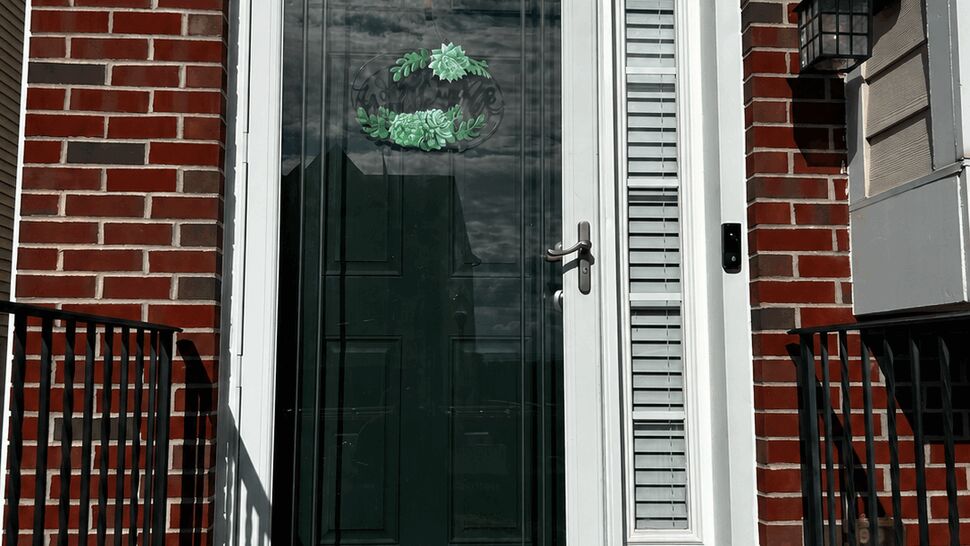 Glass Storm Door Entry | Tycos Roofing And Siding Inc Front brick entry with glass storm door and welcome mat
