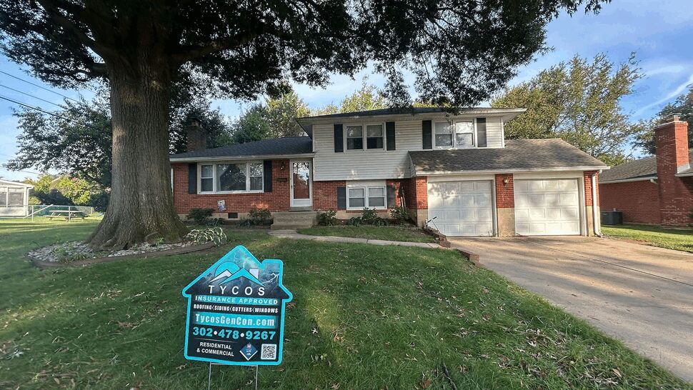 Residential Roofing Project | Tycos Roofing And Siding Inc Brick ranch home with a Tycos roofing sign in the front yard