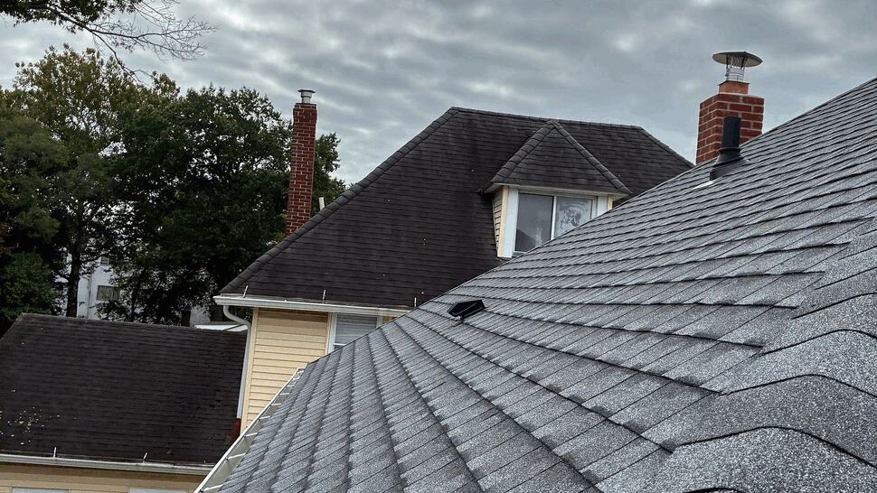 Gray Shingle Roof Installation | Tycos Roofing And Siding Inc Close view of gray architectural roof shingles on a residential home