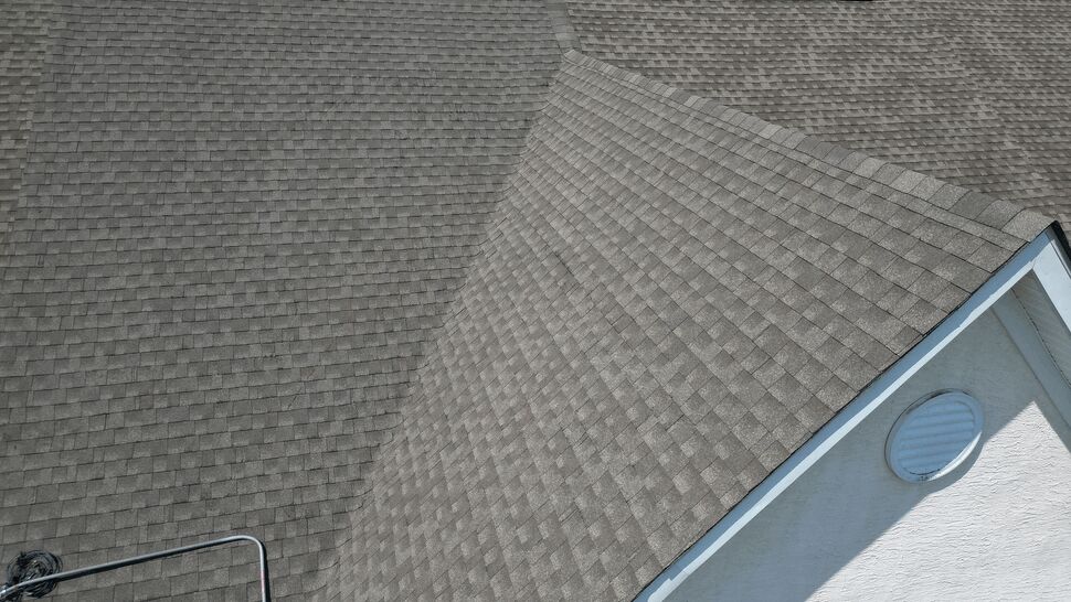 Close-up of hip ridge and shingle pattern on roof slope