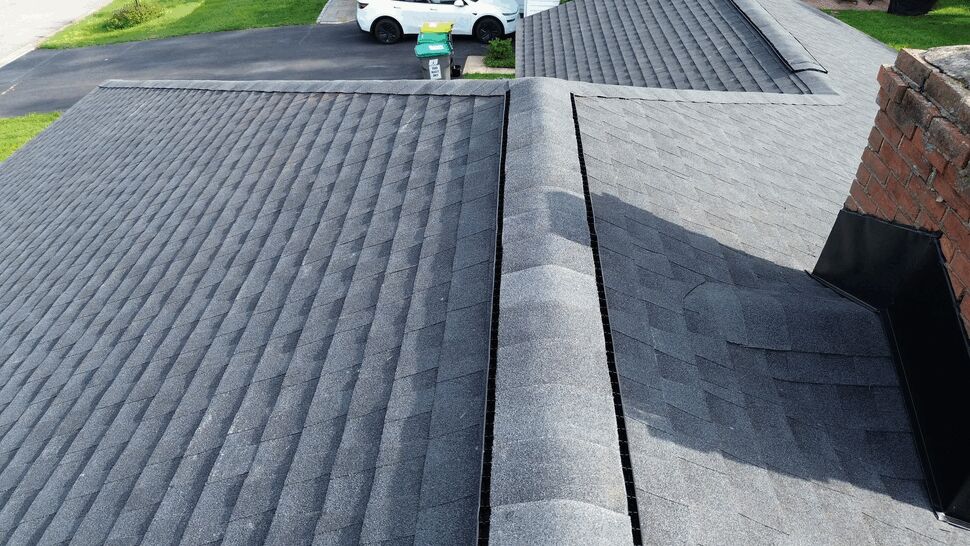 Ridge Vent and Shingle Detail | Tycos Roofing And Siding Inc Close-up of a roof ridge vent and shingle details.