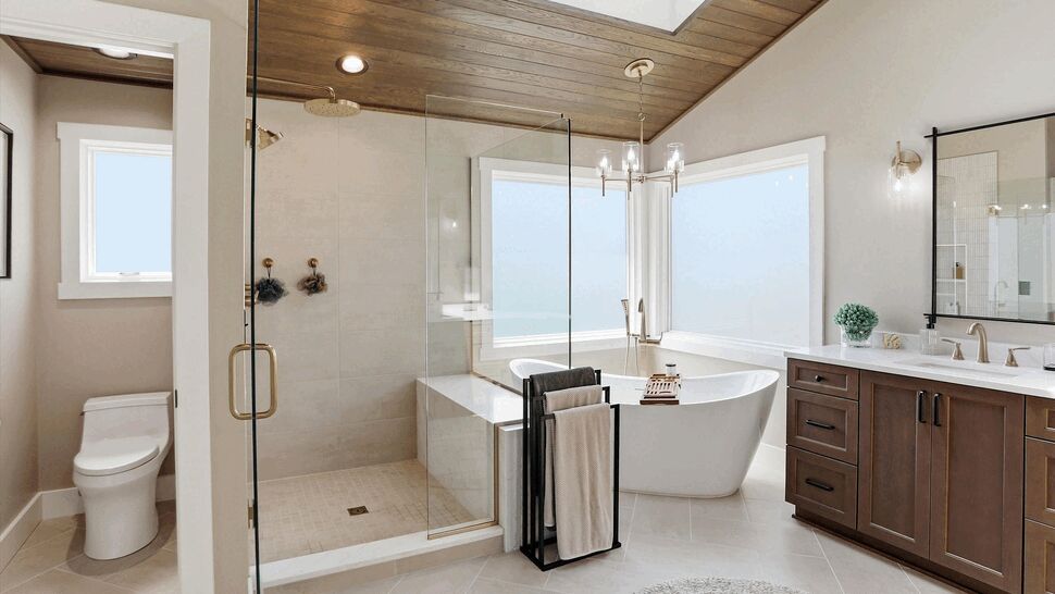 Open bathroom layout with walk-in shower, freestanding tub, and tiled floor.