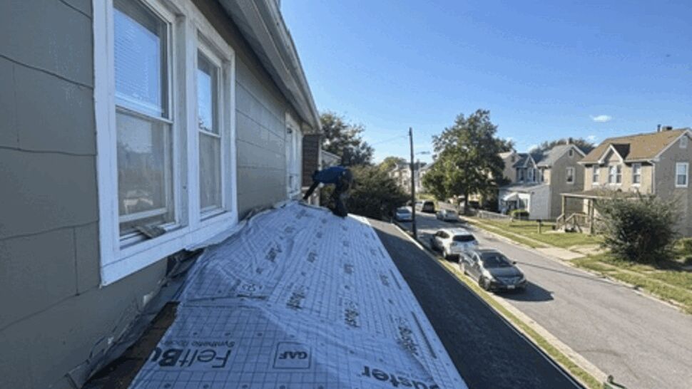 Roof Underlayment Installation | Atlas Exteriors Roof underlayment installed beside a house before shingles