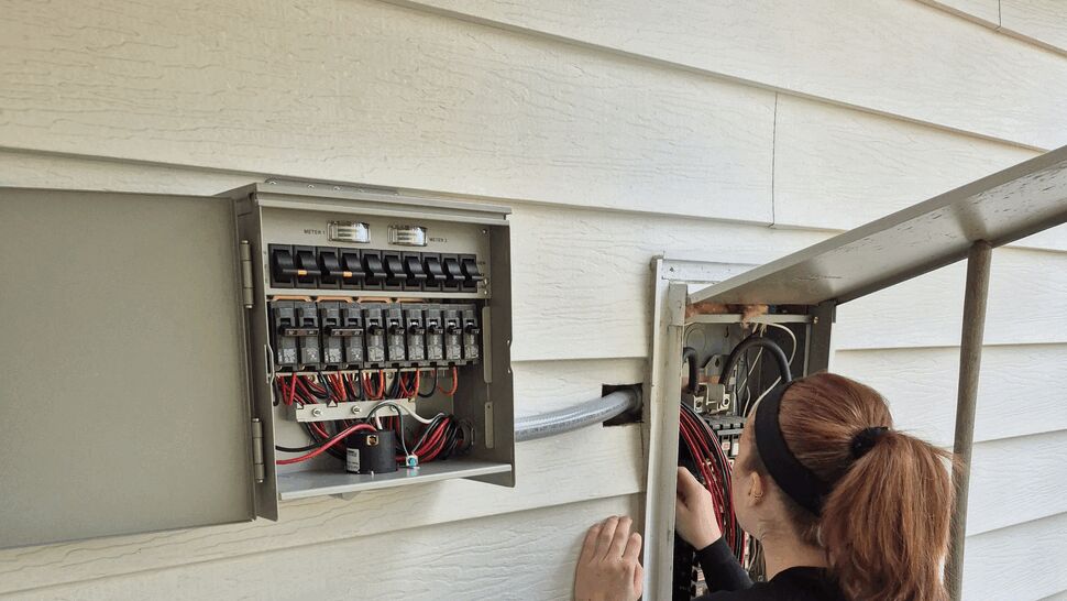 Portable generator backup power inlet installation on residential home in Enumclaw WA