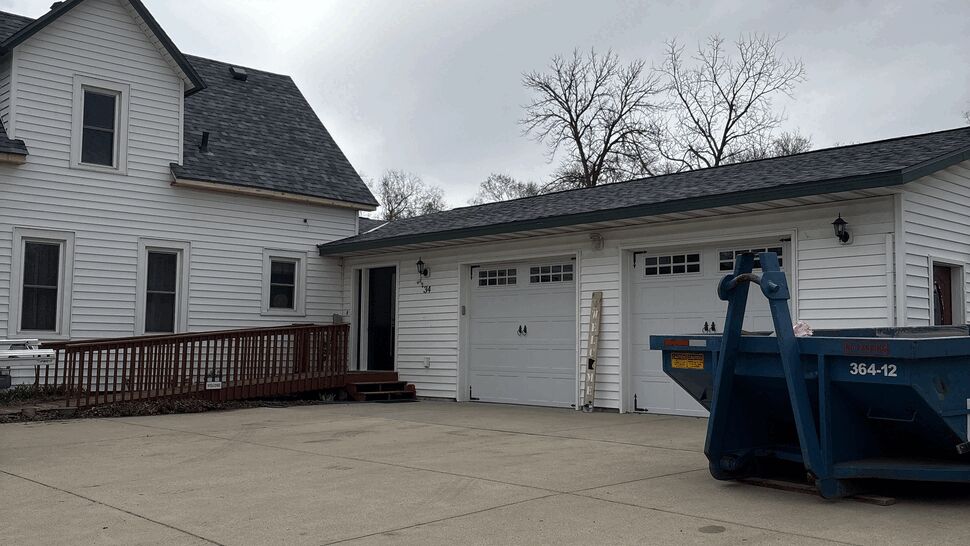 New GAF Timberline HDZ shingle roof with new fascia and seamless gutters with LeafFree gutter guards on a home in Kimball, MN