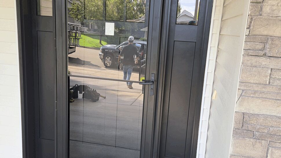 Black modern entry door with sidelights | Lutgen Companies New Therma-Tru Exterior Door Black i color with a Black Anderson Storm Door.