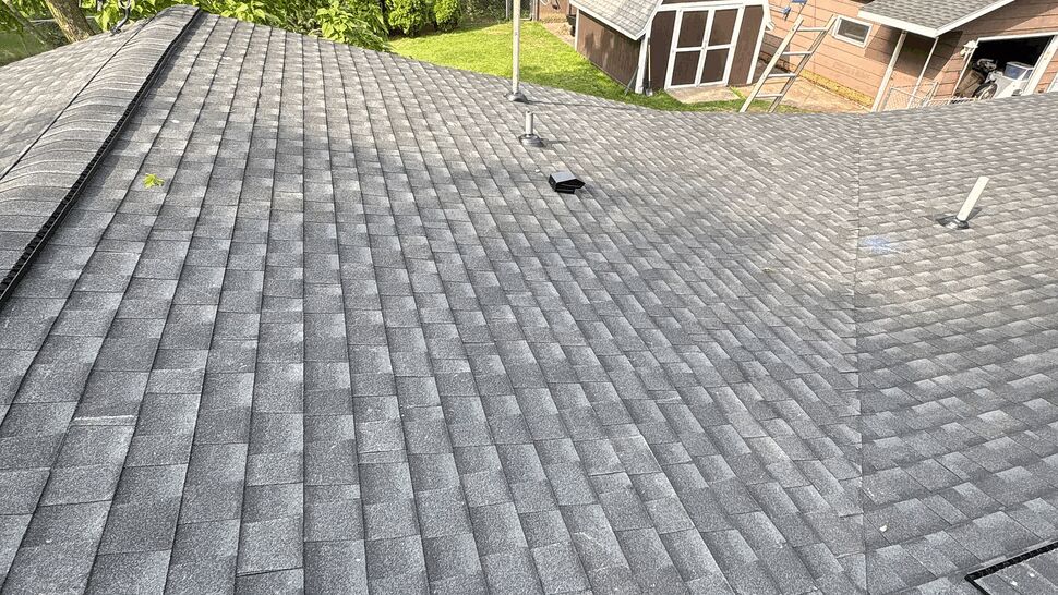 Roof Ridge and Vent Inspection | Lutgen Companies Roof ridge and vents with yard and shed visible from above