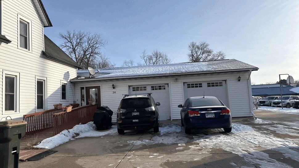 Before picture of a New GAF Timberline HDZ shingle roof with new fascia and seamless gutters with LeafFree gutter guards on a home in Kimball, MN