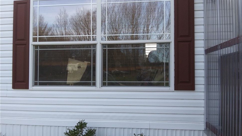 Windows Project in Sandy Creek, NY by C. Michael Exteriors, Inc.