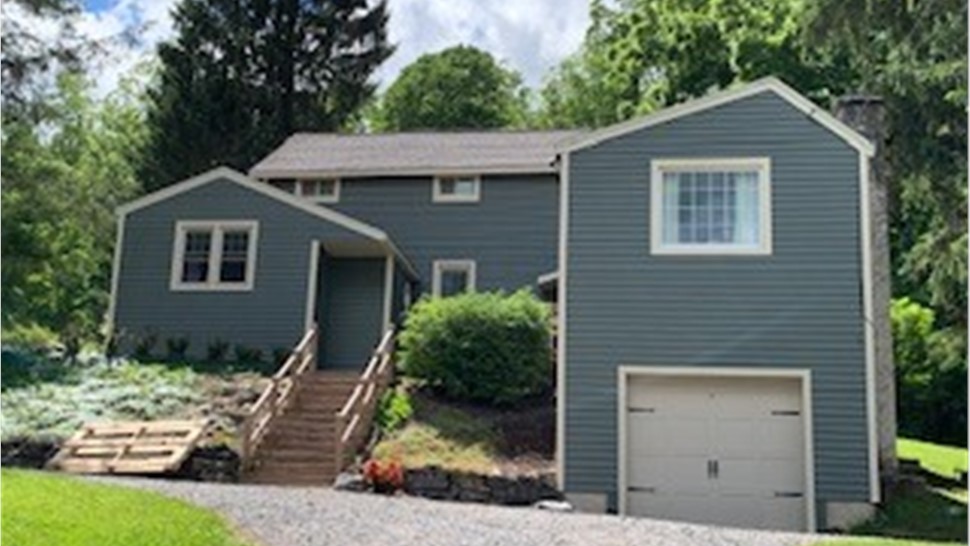 Siding Project in Syracuse, NY by C. Michael Exteriors, Inc.