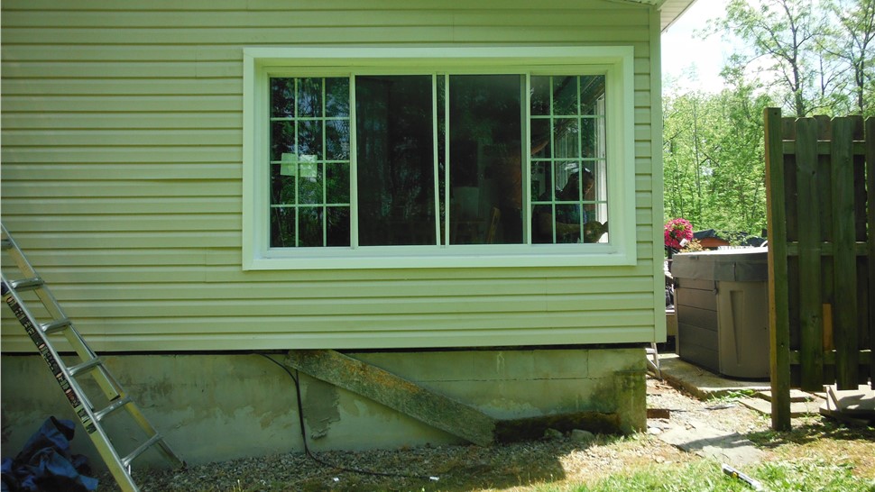 Windows Project in Locke, NY by C. Michael Exteriors, Inc.