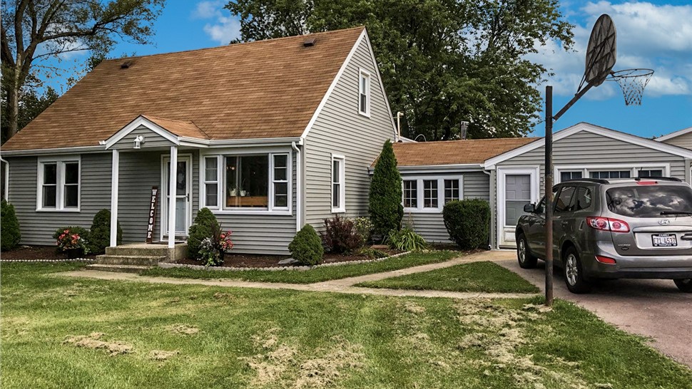 Gutters, Siding Project in Orland Park, IL by Stan's Roofing & Siding