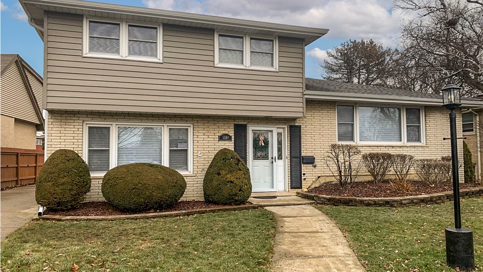 Gutters, Siding Project in Oak Lawn, IL by Stan's Roofing & Siding