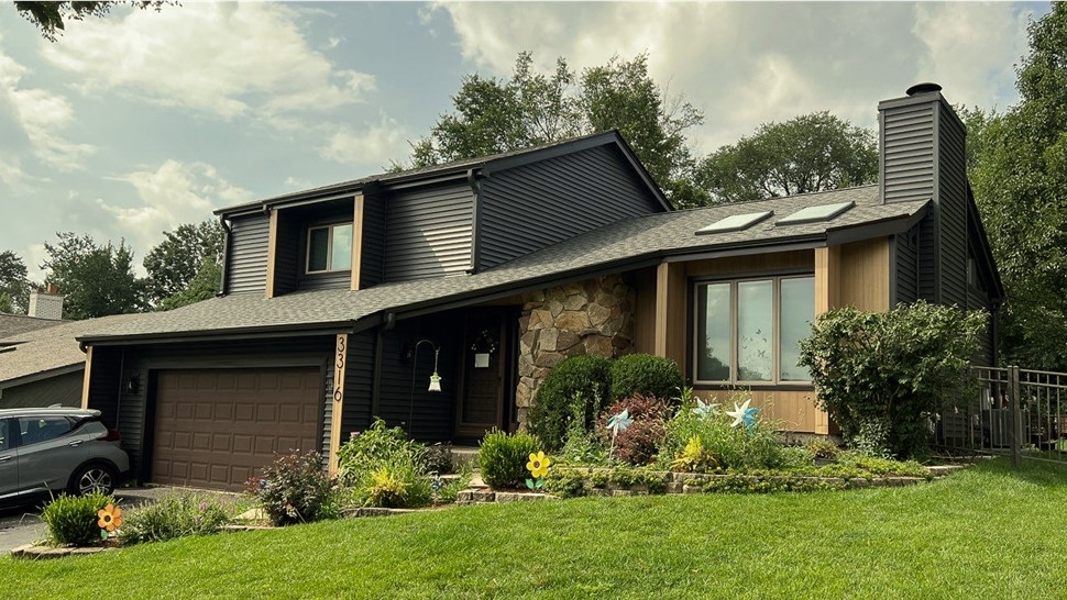 Gutters, Siding, Soffit and Fascia Project in Woodridge, IL by Stan's Roofing & Siding