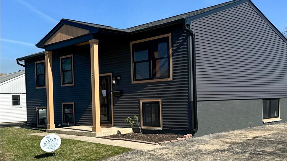 Attic Insulation, Doors, Gutters, Roofing, Siding, Soffit and Fascia, Windows Project in Romeoville, IL by Stan's Roofing & Siding